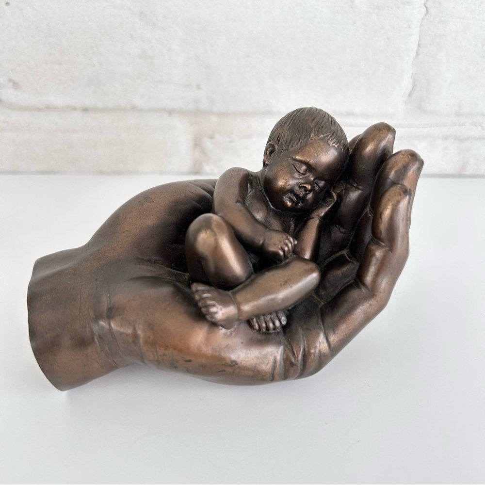 Bronze Baby in Hand Sculpture by  Oliver Tupton